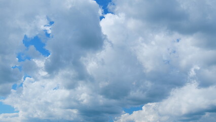 Beautiful Sky Background. Blue Sky With Clouds As Blue Backdrop In Air. Blue Sky With White Clouds. Zoom Out.