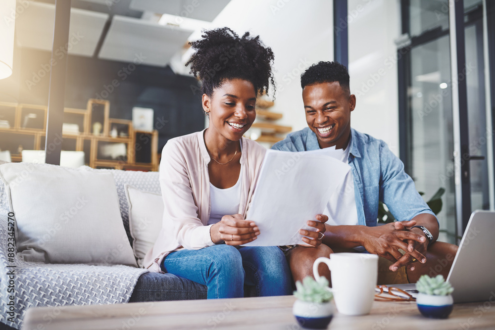 Sticker Budget, laptop and couple with paperwork on sofa for bills, life insurance or mortgage. Lens flare, documents and black man with woman on computer for planning finances, payment or investment in home