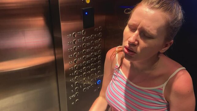 young woman experiencing exhaustion and fear in elevator
