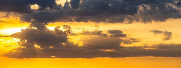 Cloudy picturesque sky during sunset