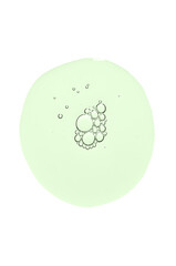 A drop of body serum or cosmetic oil with bubbles. Liquid skin care product. Isolated on a white background.
