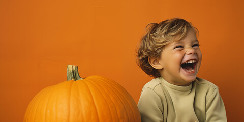 Happy Thanksgiving day traditional backdrop. Kid with pumpkin. Celebrating autumn holidays.