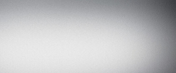 Subtle grain texture effect on a silver metallic gradient background