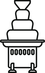 Chocolate fountain machine making a waterfall of chocolate for dipping fruits, marshmallows, and other treats