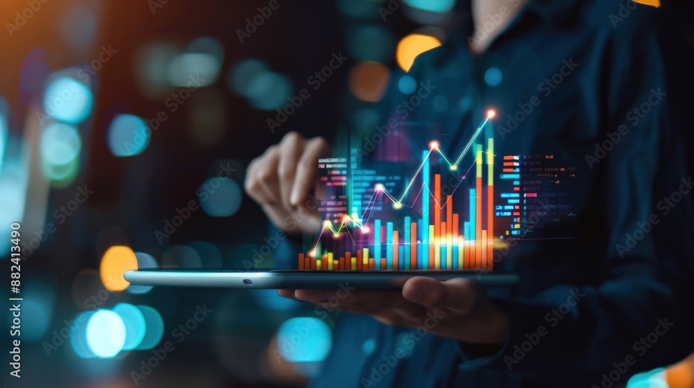 Poster a person is holding a tablet with a graph on it. the graph shows a rising line, which could represen