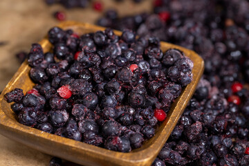 various blueberries after freezing are on the table