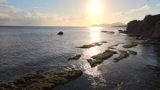 Drone shot over a beach at Vieques, Puerto Rico, USA at sunset 