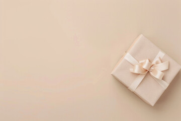 A minimalist image featuring gift box on the right. The gift is wrapped in pastel paper with a ribbon bow, against a solid, neutral background with empty space on the left