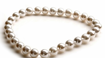 Obraz premium Elegant pearl necklace arranged in a circular shape, isolated on a white background, showcasing the lustrous and classic beauty of the pearls
