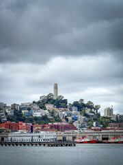 Scenic view of downtown San Francisco with Coit Tower, California, USA seen from the water against...