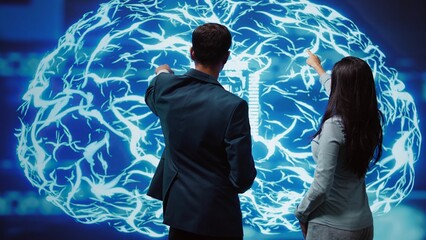 IT staff members using artificial intelligence computing simulating human brain thought processes....