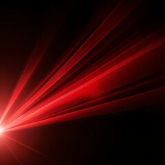 Shades of red flare of light on plain black background 
