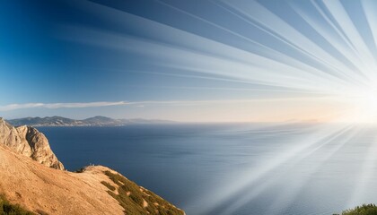 Shades of orange flare of light on plain black background 
