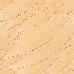 Seamless 4k photo texture of dotted and patterned seams cardboard paper.