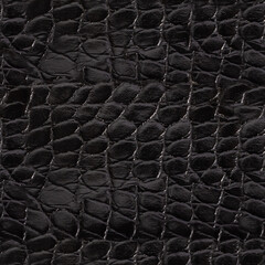 Seamless 4k photo texture photo of polished black colored alligator skin leather material.