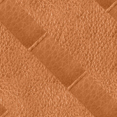 Fototapeta premium Seamless 4k photo texture photo of light brown colored leather material embossed with diagonal line pattern.