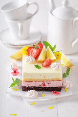 Homemade and fresh strawberry sponge cake with jelly and fruits.