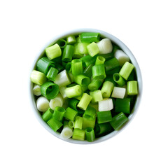 Chopped spring onions in a ceramic bowl isolated on white background. Top view.