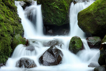 Landscape photography at a waterfall using slow shutter speed techniques