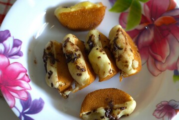 Traditional Indonesian pancake called pukis served on a plate