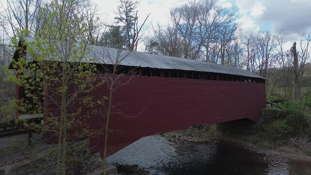 Parr's Mill covered bridge near Catawissa, PA. Flight at bridge level, flying towards the bridge with a slight rise. Shot in early Spring.