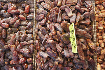  many date fruits display for sale at local market 