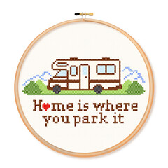Cross stitch embroidery, travel recreational vehicle motor home on the road in landscape with Home is Where You Park It text, wooden embroidery hoop, isolated on white 