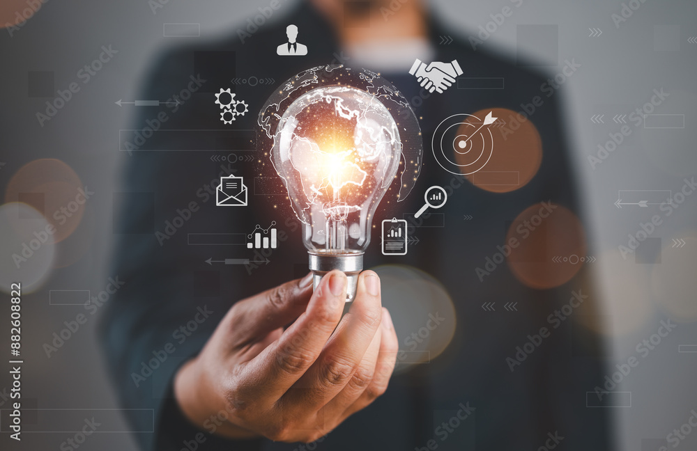 Poster businessman holding light blub with virtual global internet connection. global internet connection a