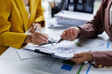 Closed up of two business brainstorm discussion, meeting of business team working financial trading growth, together, project team corporate briefing.