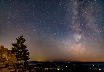A star filled sky hangs over a beautiful scene in the Pacific Northwest