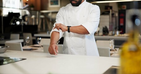 Chef, man and roll sleeves in kitchen for hospitality, catering or service industry. Hands,...