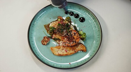 Above, plate and food for fine dining or cuisine in restaurant for dinner or catering service. Table, hospitality and menu with presentation for customer or client with vitamins for luxury and meal