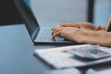 Business people team working at office with tablet and document, doing planning analyzing the financial report, business plan investment, finance analysis concept. Economic business discussions.