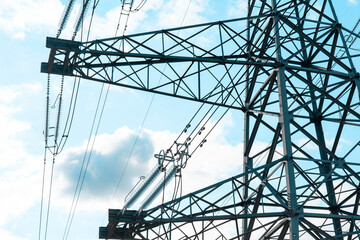 Steel Power Transmission Tower Against A Blue Sky