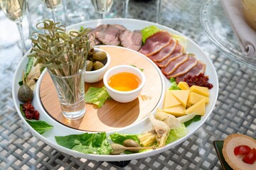 Delectable Charcuterie Board Display of Assorted Meats, Cheeses, and Appetizers