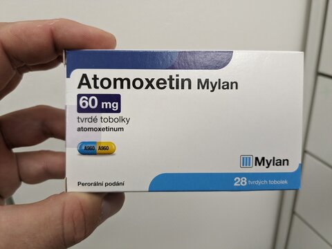 Prague, Czech Republic - July 10 2024: ATOMOXETIN MYLAN box of medication with ATOMOXETINE active substance by MYLAN, used for treatment of ADHD.