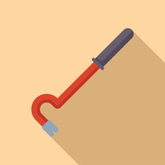 Red crowbar is lying on a beige background, casting a long shadow