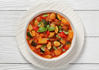 hearty italian vegetable stew in bowl, top view