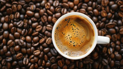 Fototapeta premium Delicious coffee cup next to coffee beans
