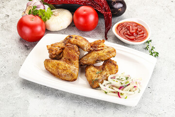 Grilled chicken wings with sauce
