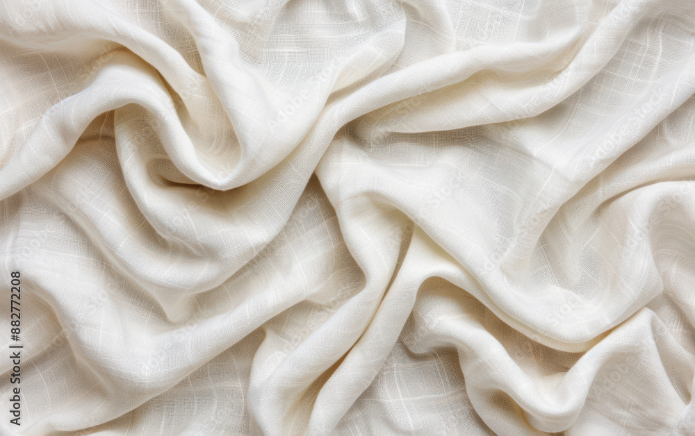 Poster close-up of smooth, white crumpled fabric creating elegant folds and textures for background or desi
