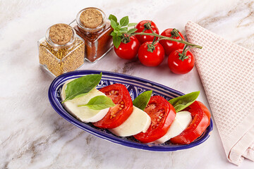 Italian caprese salad with mozzarella