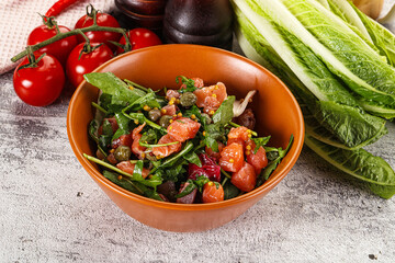 Salad with salmon and arugula