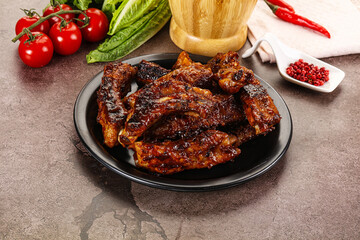 Grilled pork ribs in barbecue sauce