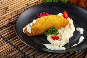 Chicken Kiev cutlet with puree