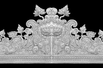 Decorative Art of Lanna Thai. silver carving art on temple wall . Srisuphan temple , Chiang mai, Thailand , (Public area) isolated on black