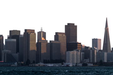 A view of the San Francisco skyline at dusk with various modern buildings against a light sky