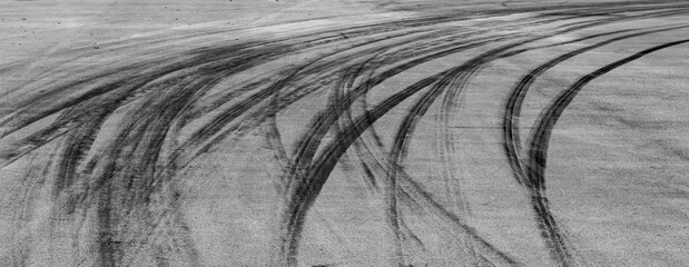 Aerial view Textured background vehicle trace on asphalt road, Tire print texture background...