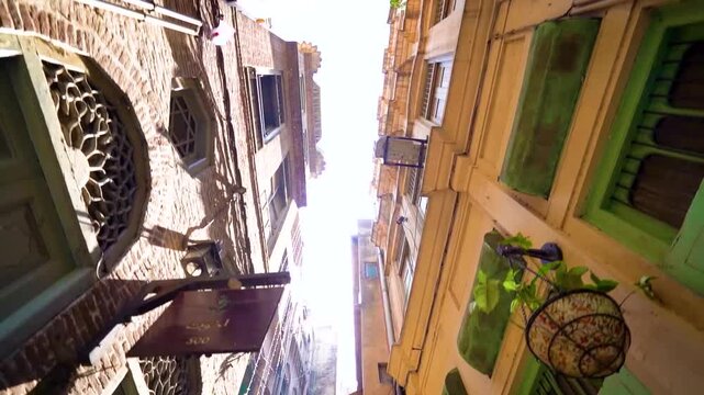 A narrow pedestrian street in the old town of Lahore, Pakistan.