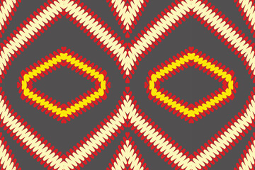 African Ikat paisley seamless pattern.geometric ethnic oriental pattern traditional on brownbackground.Aztec style abstract vector illustration.